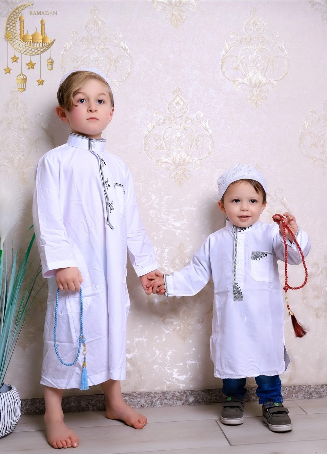 دشداشه وطاقية باللون الابيض للاطفال