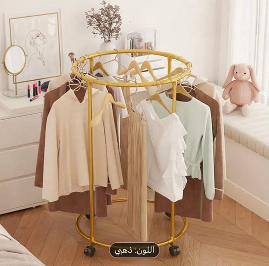 ستاند معدني دائري للملابس باللون الذهبي